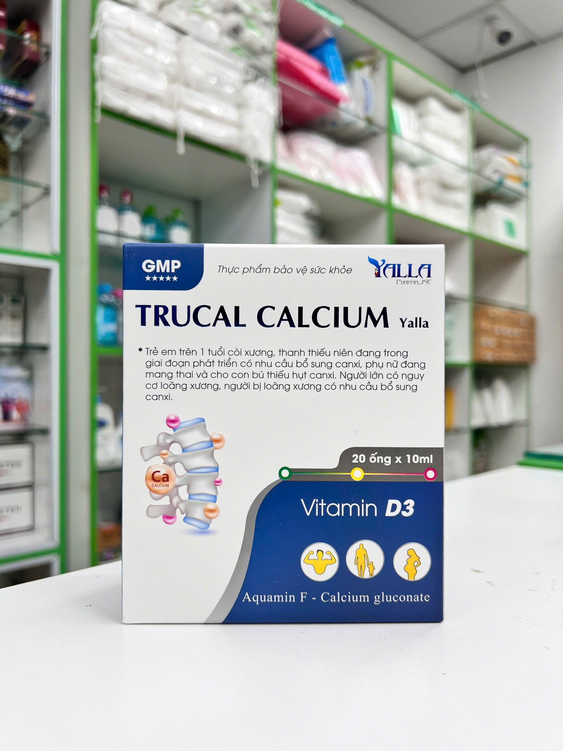 Trucal Calcium — hộp sản phẩm trắng xanh dương, nhãn GMP, dạng ống uống